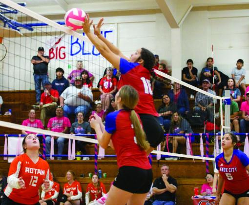 RETURNED Addyson Ledesma meets the ball at the net for the return in the Houndettes win over Rotan. | SHERI BATY PHOTO