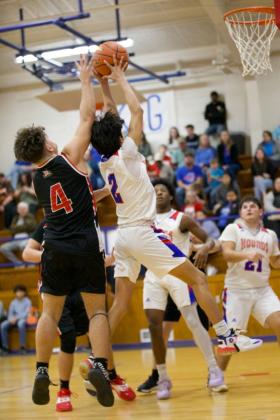 Joe Adam Morelos grabs the rebound. | SHERI BATY PHOTO