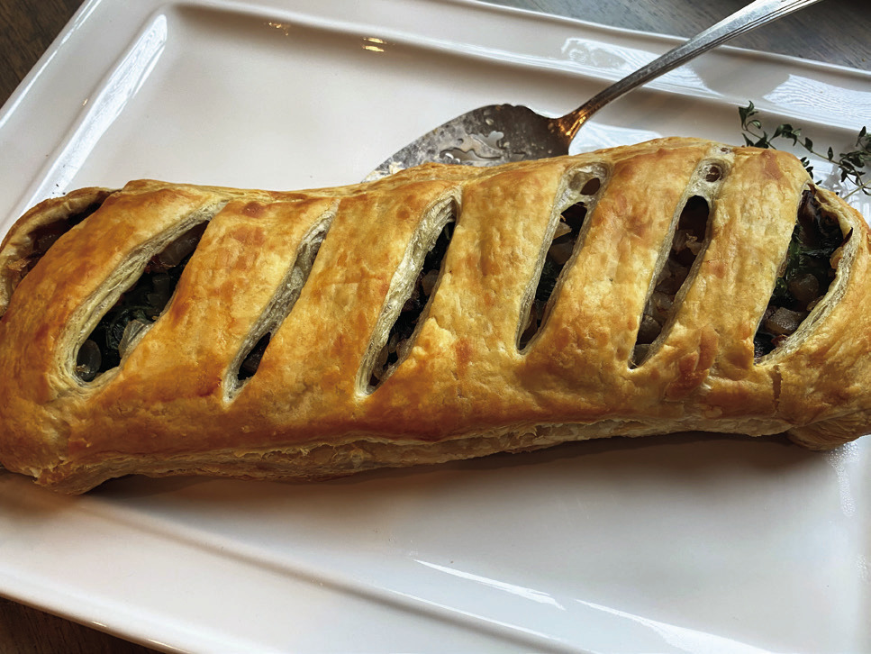 MUSHROOM WELLINGTON is a culinary delight you won’t want to miss! This dish beautifully combines earthy, rich mushrooms with a flaky, golden pastry that envelops a rich filling, creating a comforting yet sophisticated dining experience. | ANGELINA LARUE PHOTO