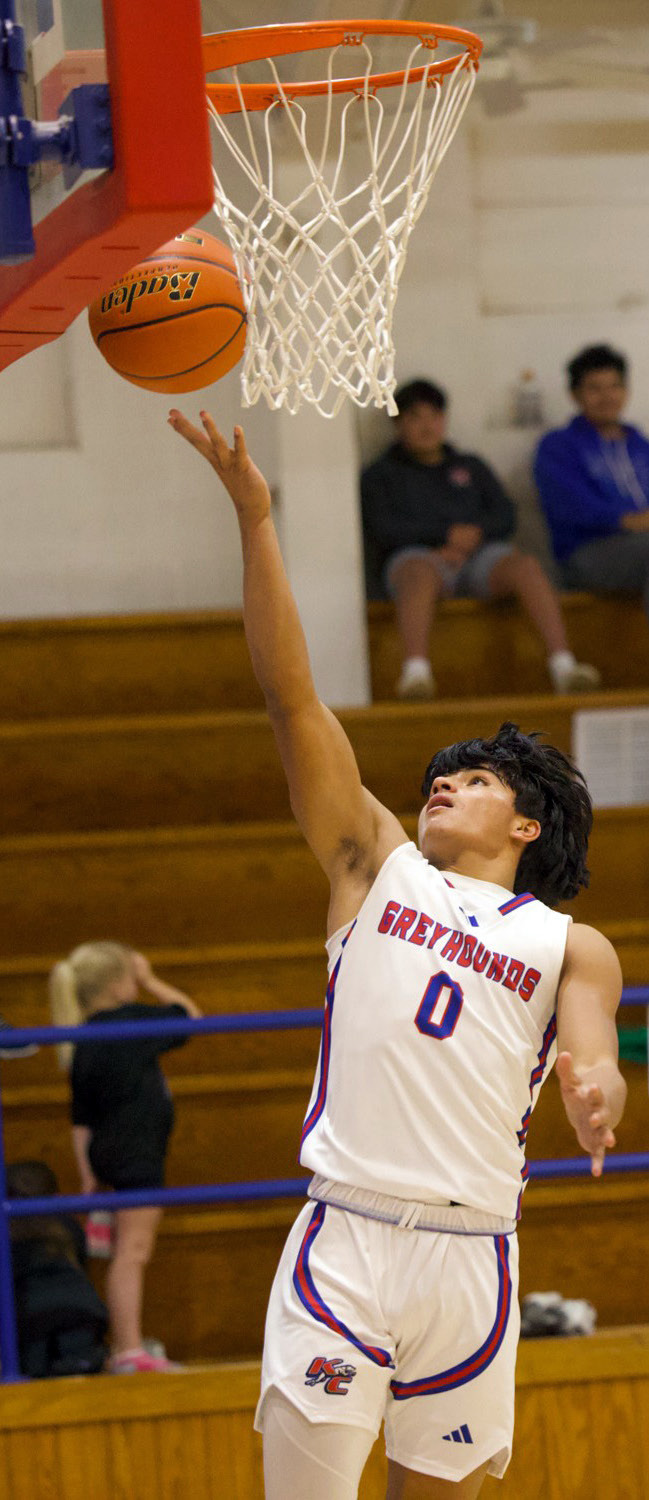LAYUP FOR NET GAIN Knox City’s Zander Abila takes the layup for the net gain againstWoodson in last week’s game. | SHERI BATY PHOTO