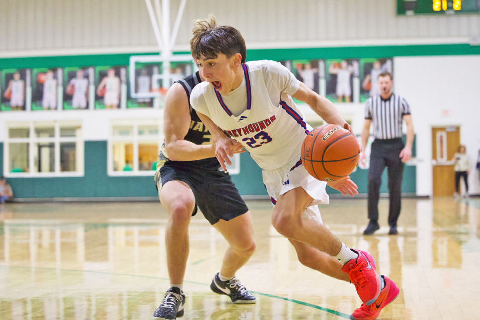 GREYHOUND ON THE RUN Izaiah Trevino, #23, proves a driving force for the Greyhounds on the court. | SHERI BATY PHOTO