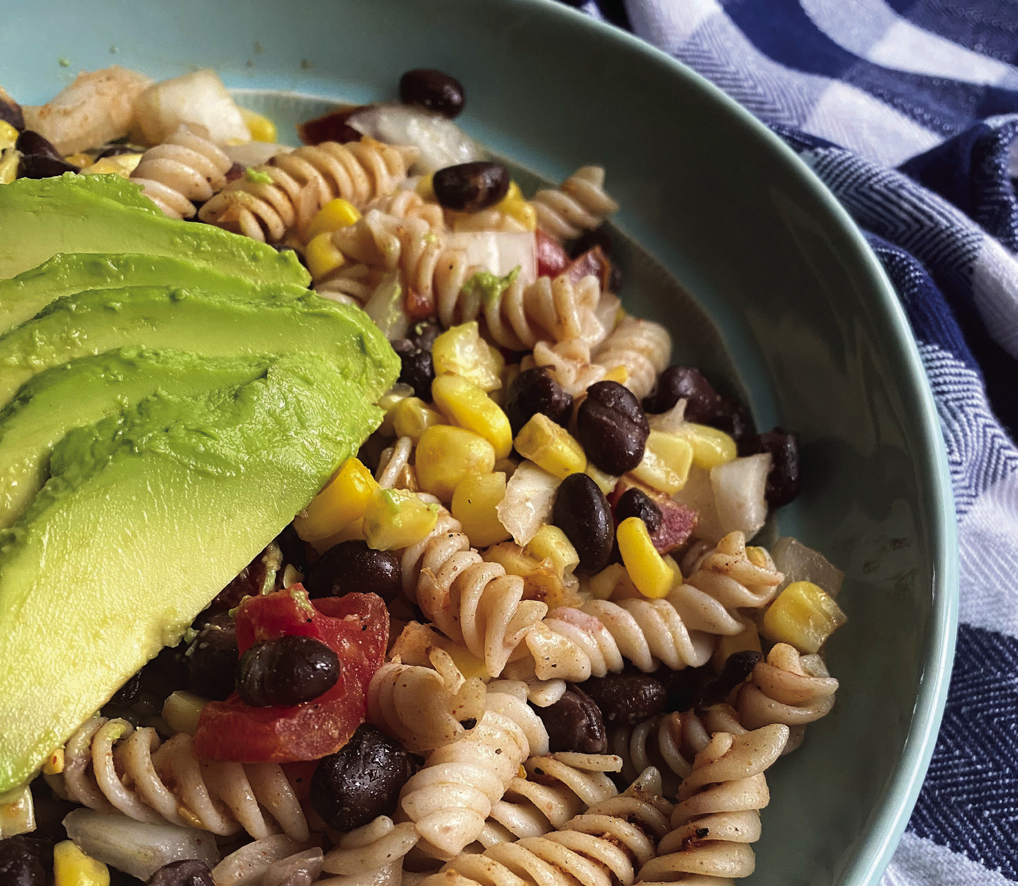TEXAS PASTA SALAD A southwest pasta salad is vibrant with flavor that’s both satisfying and refreshing! Imagine tender pasta mingling with sweet corn, juicy black beans, and crunchy bell peppers, all tossed in a zesty, creamy dressing. It’s a quick and easy meal, perfect for a warm day, and is customizable. This dish is sure to tantalize your taste buds and provide a satisfying and delicious meal. | ANGELINA LARUE PHOTO