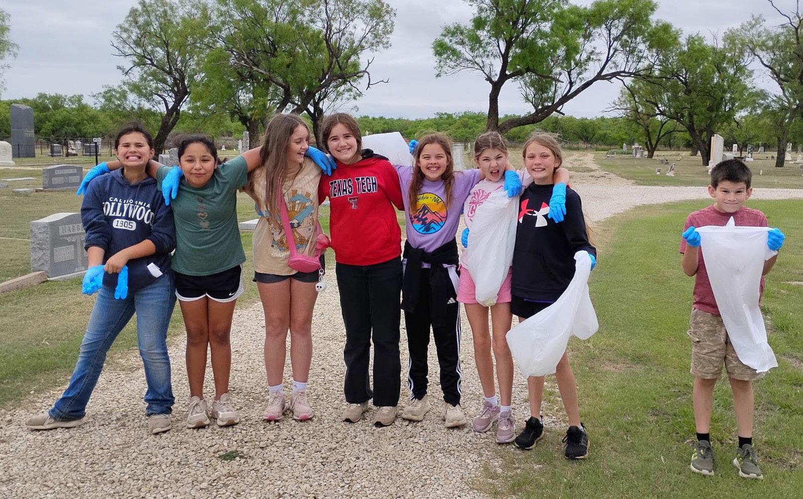 EARTH DAY CLEANUP To help commemorate Earth Day, the Benjamin 5th grade science class provided a little community service and cleaned up trash at and around the cemetery. | COURTESY PHOTO