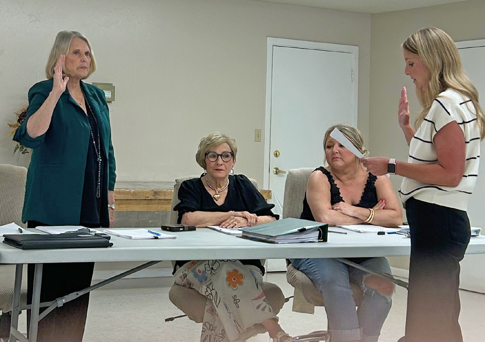 NEW MUNDAY MAYOR Karen Longan, former mayor pro tem, was sworn in April 15 by municipal judge Laura Hampel. Council member Ryan Redder will be sworn in as mayor pro tem at a future meeting. | TROY PARTON
