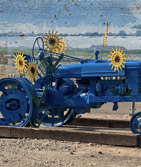 METAL MARVELS Knox City, Texas, has long enjoyed the benefits of delighting travelers and residents with its series of colorfully painted sculptures made from tractor and implement parts reimagined as insects, growing things, and more. They are installed throughout town, often in proximity to murals on weathered walls. | COURTESY PHOTOS