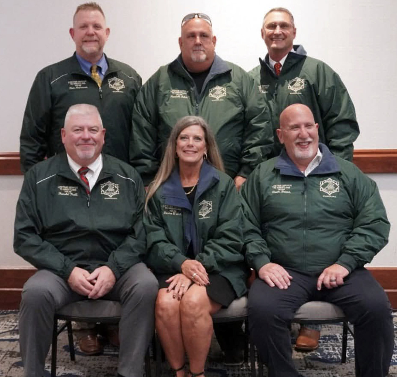 GREEN JACKET Longtime Tascosa girls wrestling coach Donna “Coach Welch” Daniel (front row, center), a science teacher and a 1968 graduate of Munday High School and the daughter of Lloyd Don Welch and Jaquita Welch, was inducted into the Texas chapter of the National Wrestling Hall of Fame recently at the Embassy Suites in Grapevine. | NATIONAL WRESTLING HALL OF FAME, TEXAS CHAPTER
