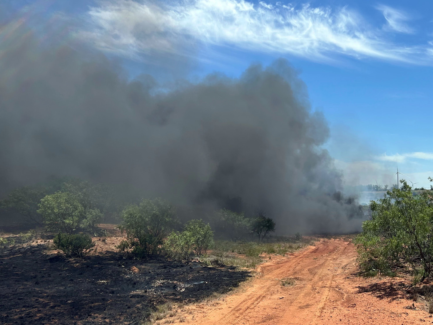HEAVY SMOKE Thick smoke from hundreds of smoldering rubber tires filled the air and shut down a portion of highway 222 in Knox County Thursday afternoon. There were no buildings involved, and the fire was covered to the south side of the highway.