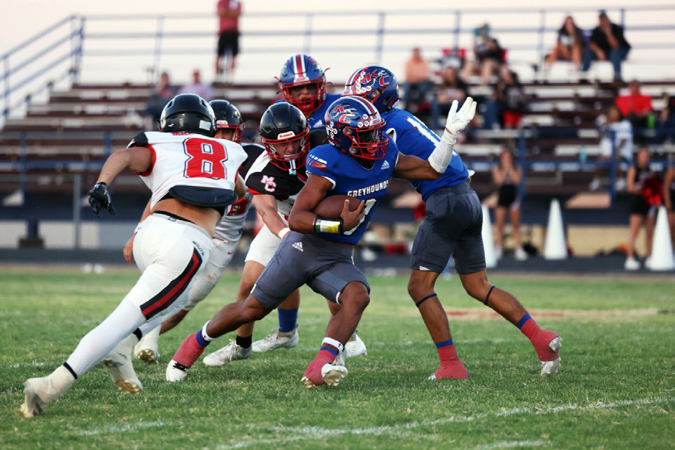 BREAKING FREE Greyhound Zander Abila eludes the tackle for a big run in Matador Sept. 19. | SHERI BATY