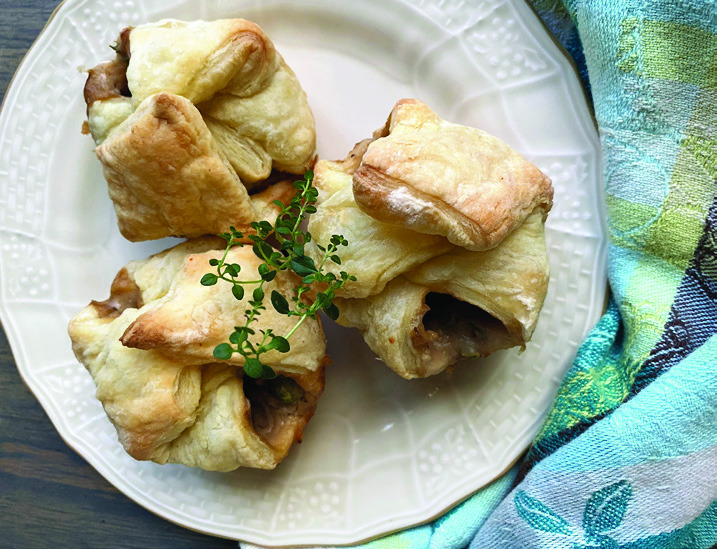 MINI MUSHROOM POT PIES are a delightful culinary experience that combines comfort and gourmet flair. These pastries are filled with a savory taste of mushrooms, a creamy sauce, and fresh herbs. Creating a flavorful bite in every bite. Perfect as an appetizer or a main dish, they are easily shareable and add a touch of elegance to any meal. Plus, they are a fantastic way to enjoy vegetables. This delicious, soon to be, comfort food will warm your heart and satisfy your cravings. | ANGELINA LARUE PHOTO