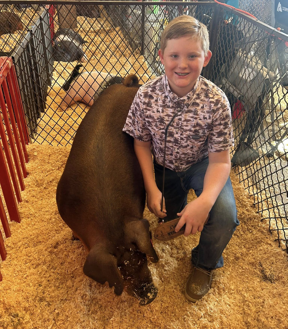 MUNDAY FFA STATE FAIR Munday FFA was represented well at the State Fair of Texas on Oct. 2, where Landree placed seventh, Braylynn placed 5th and Paige placed 4th. | COURTESY PHOTOS