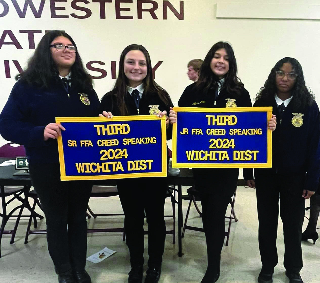 FFA WICHITA DISTRICT BANQUET Lexi Abila received her banner for Jr. Creed Speaking and Kinlee Eaton received her banner for Sr. CreedspeakingattheWichitaDistrictBanquet. | COURTESYPHOTO