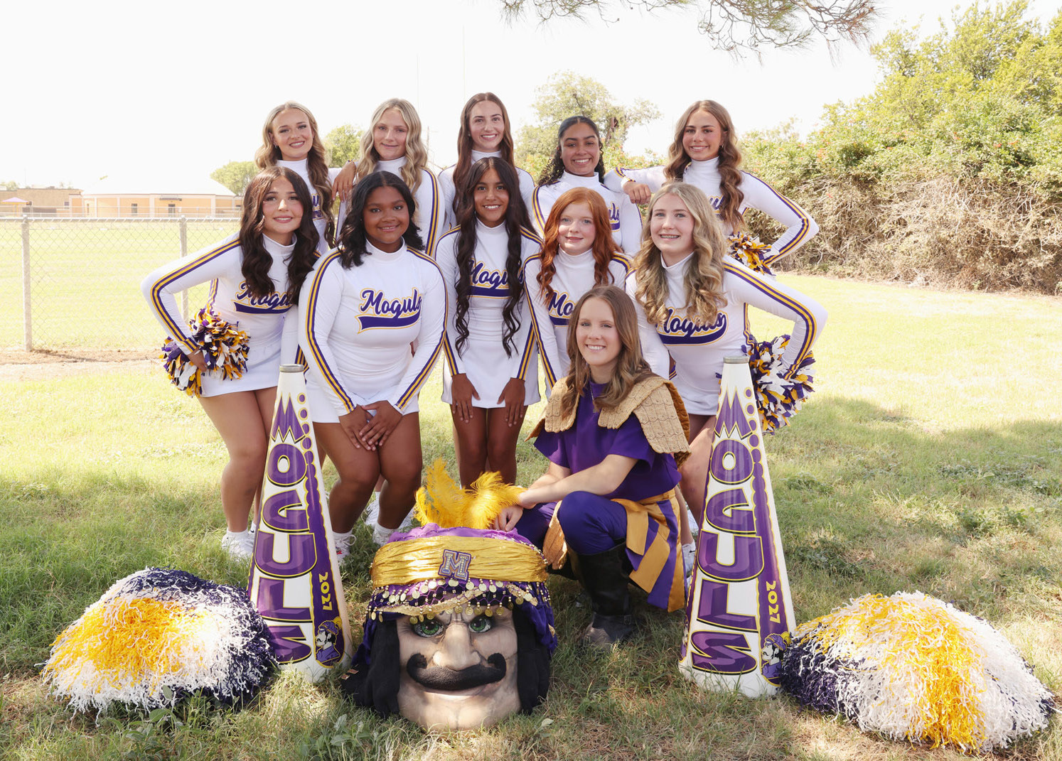 Munday Varsity Cheerleaders: Olivia Myers, Rachel Hernandez, Aaralynn Taylor, Jasmyn Diaz, Cody-Rae Hunter, Addyson Johnson, Braylynn Myers, Arli Josselet, Ashlynn Young, Avery Moore; Hadleigh Sanders, Mascot