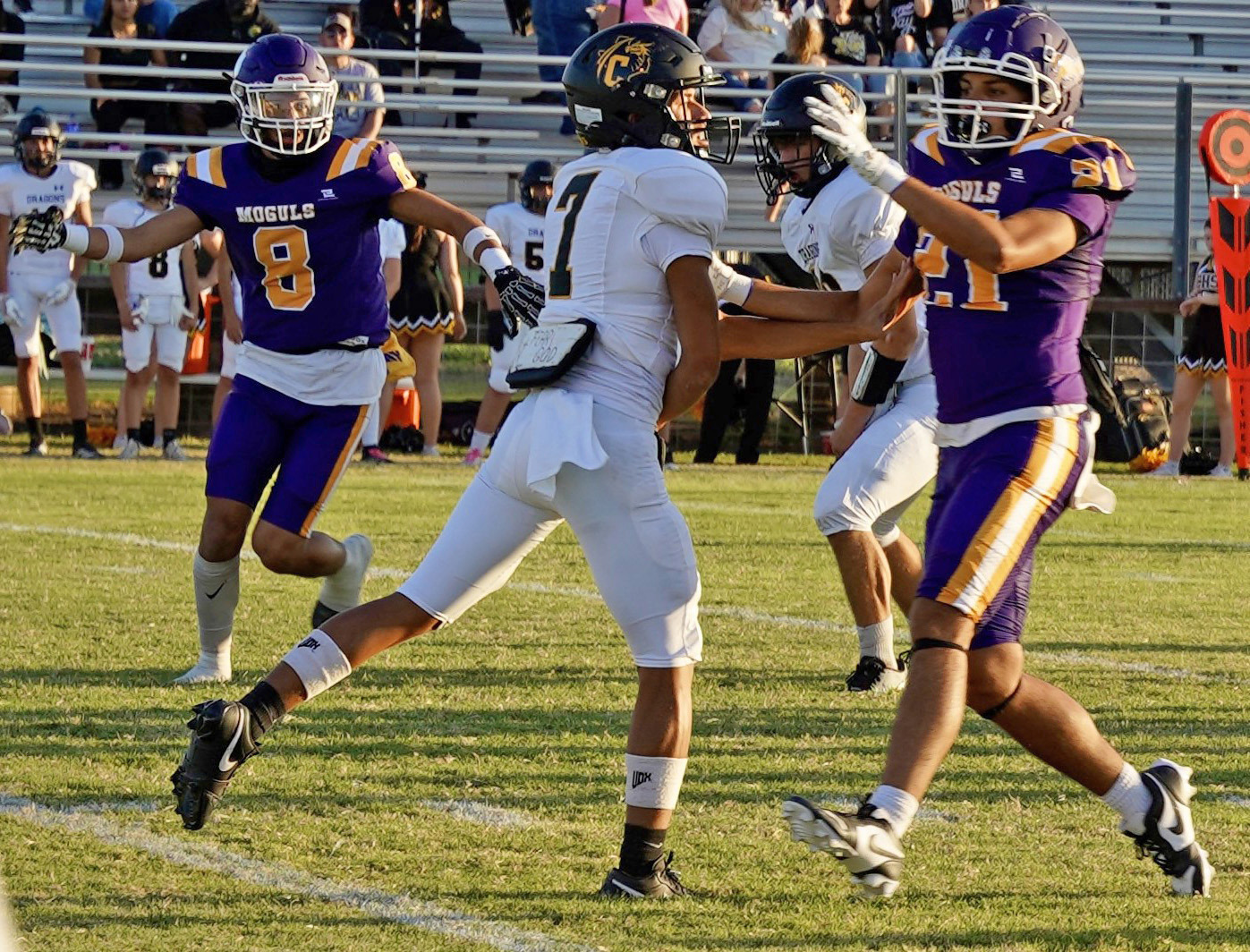 PRESSURING THE QUARTERBACK David Walker gets into the backfield and rushes the Dragon quarterback in Friday night’s game against Chico. MORE MOGUL PHOTOS, PAGE 8 | LACI BOWMAN PHOTO