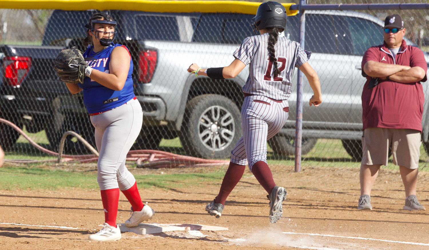 YOU’RE OUT! Aubrey Lerma gets the out at first in a March 23 contest against Northside. | SHERI BATY