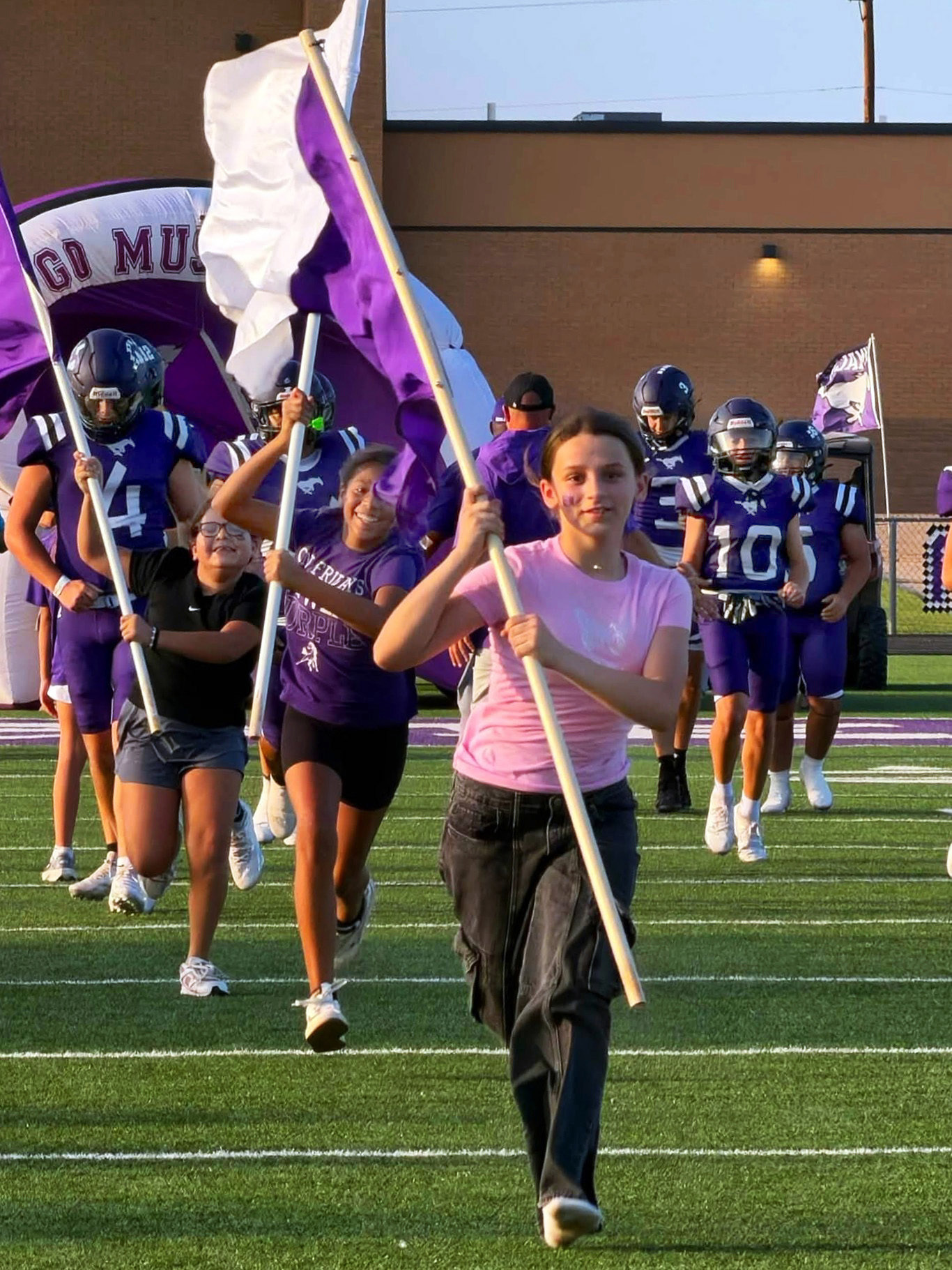 LIKE WILD MUSTANGS the Benjamin players sprinted onto the turf prepared to tangle with the Tigers from Groom Friday, Sept. 4, at home. The Mustangs claimed the victory, 48–40. MORE PHOTOS, PAGE 4 | COURTESY PHOTO