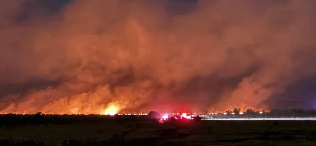 OMINIOUS GLOW The massive Grover Bend fire could be seen from miles away. Fortunately the fire was in a sparse vegetation area away from structures. | COURTESY PHOTO