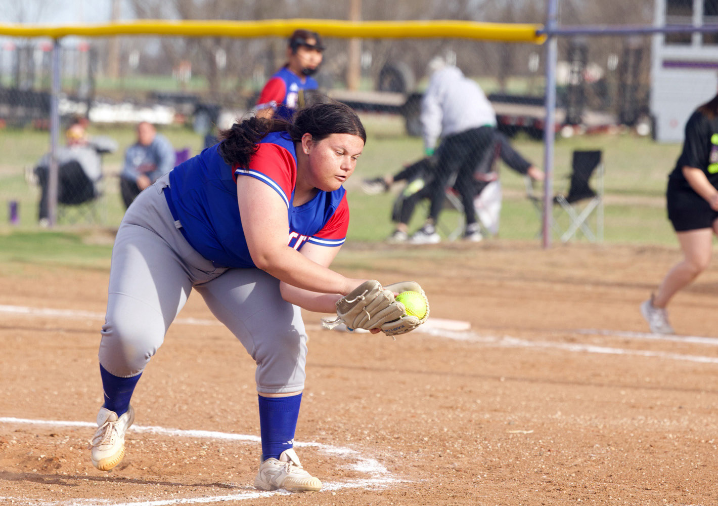 Gabi Martinez catches the line drive to the pitcher’s mound