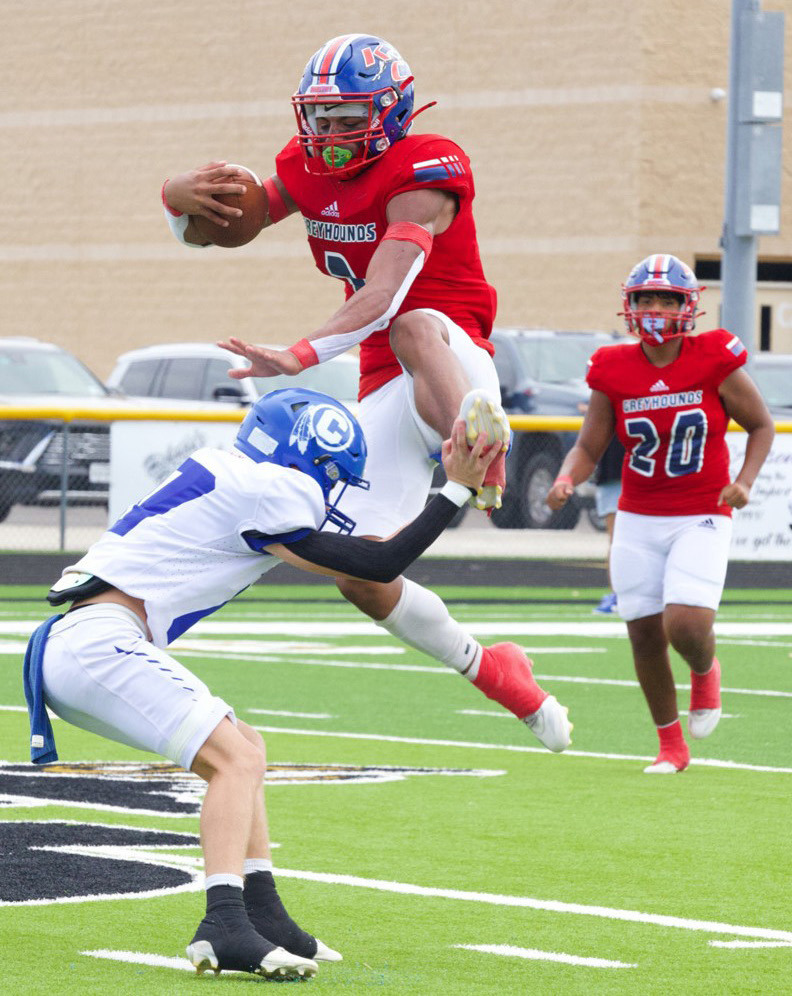 KC GREYHOUNDS SEASON OPENER The Greyhounds opened their 2025 football season at the Jayton Gridiron Classic against Cherokee on Saturday, Aug. 30, falling 30-62 to the Indians, despite Zander Abila leaping to new heights to gain some yards. | SHERI BATY PHOTO