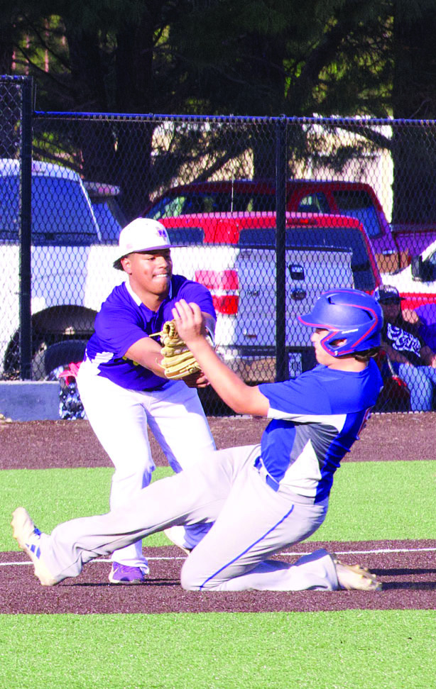 The Munday Mogul third baseman is keeping the corner hot with the tag. | SHERI BATY PHOTOS