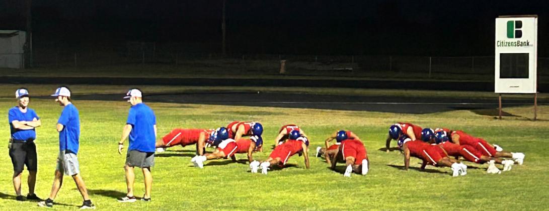 DOINGTHINGSTHEOLDWAY, seasoned coach Caleb Callaway knows what it takes—like pushups— to compete with the top dogs in six-man football, and he makes sure the players are on the same page.