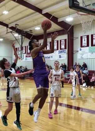 MOGULSSCOREANOTHERDISTRICTWIN Ja’RiyisWilliams scores on a jump shot from the block. | LACI BOWMAN
