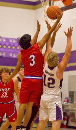 INFORTHEREBOUND Nathan Martinez secures the rebound. The Greyhounds also traveled to Throckmorton last week and dominated the game to defeat Throckmorton 48-28. | SHERI BATY PHOTO