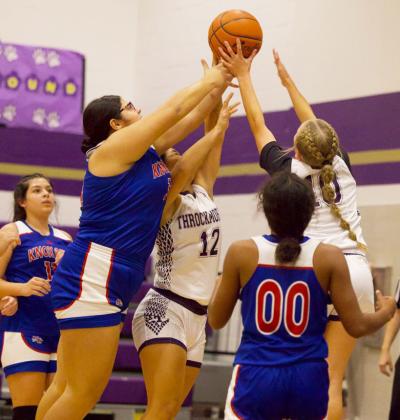 REACHING FOR THE NET Houndette Audri Perez grabs the rebound in last week’s game where Throckmorton dominated and came away win over Knox City 52-38. | SHERI BATY PHOTO