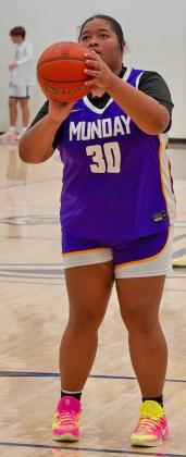 FREE-THROW SETUP Mogulette Alaylah Evans gets set up for a free throw.