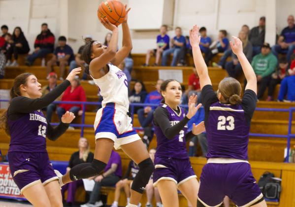 TWO POINTS DOWN Houndette Naveah Martinez knocks two points down from the lane against Harrold in Tuesday’s, Feb. 10 match-up. | SHERI BATY PHOTO