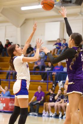 THREEPOINTER Knox City’s Bailey Espinosa fires the three pointer against Harrold. | SHERI BATY PHOTO