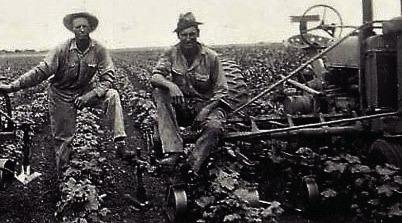 Ed Shaver on left, his son Eddie on right, sitting on John Deer Model A. On Ed’s Haskell Co. farm, @1939. Photo by Ed’s daughter Dorothy. Courtesy Photo