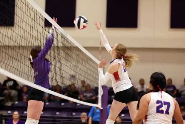 ABOVE THE NET Eren Howeth rises above, looking to earn a point for her Knox City team, in the victory at Benjamin Oct. 6. | SHERI BATY