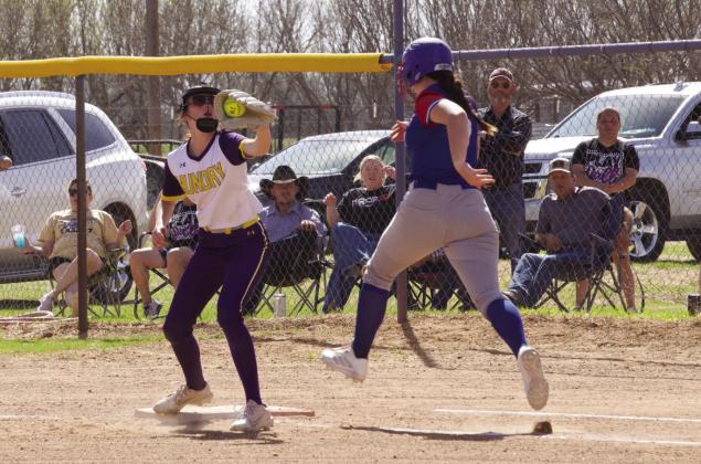 MHS pitcher Ambry Myers covers homeplate but Kinlee Eaton scores the run for the Houndettes | SHERI BATY PHOTO
