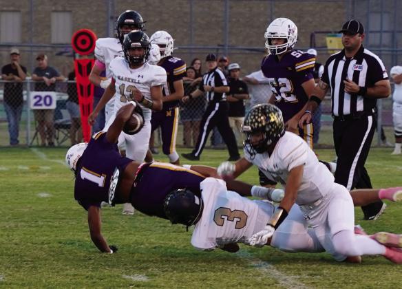 REACHING FOR THE FIRST DOWN Kiyryn Wilson stretches out to get a first down. | LACI BOWMAN