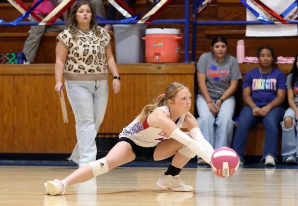 WAY DOWN Eren Howeth gets down to keep play alive with a great play Friday, Oct. 16, against Rotan, winning in 3 sets. | SHERI BATY