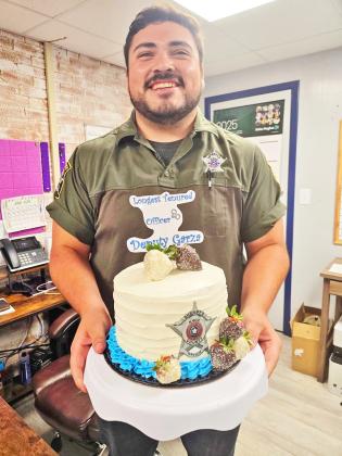 two years of service to the Knox County Sheriff’s Office with a cake from his colleagues. | COURTESY PHOTO