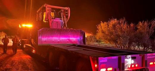 Cedar Ridge Aviation and QB Quarry supplied air support and dozers to help control the brush fires. | COURTESY PHOTOS