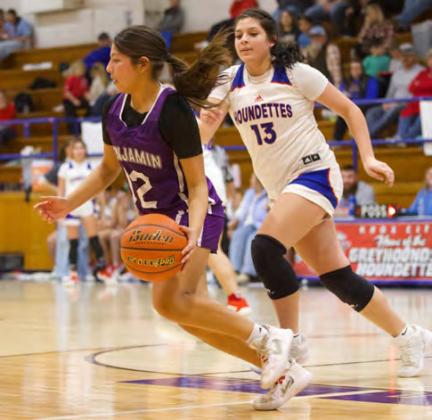 WORKING HER WAY DOWN THE COURT The Lady Stang works her way down court but the Houndettes quickly generated momentum and prevented the Lady Stangs from mounting a comeback.The Knox City Houndettes defeated the Benjamin Lady Stangs 44-21. | SHERI BATY PHOTO