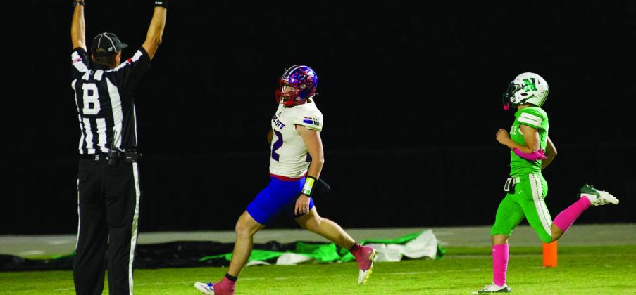 SIX POINTS John Cross Utley runs in for the TD | SHERI BATY PHOTO