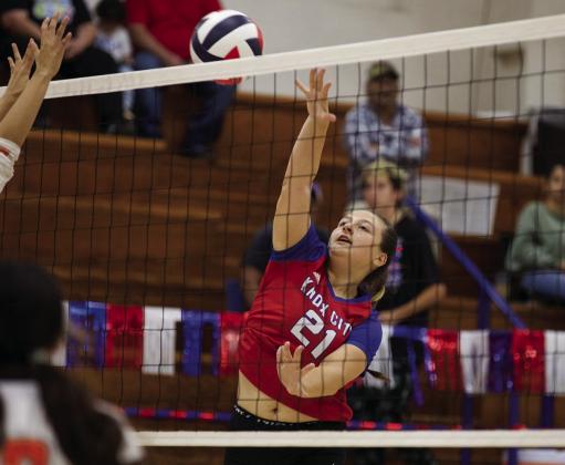 HOUNDETTES VOLLEYBALL Kylee Standfield attacks the ball at the net. | SHERI BATY PHOTO