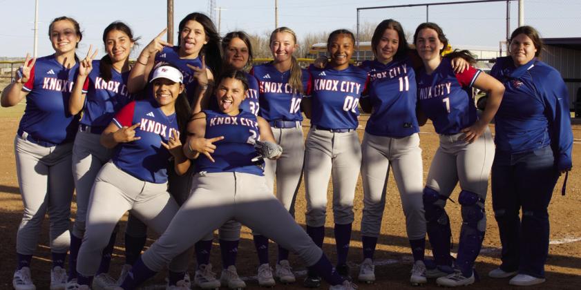 The Houndettes celebrate their first district win. | SHERI BATY PHOTOS