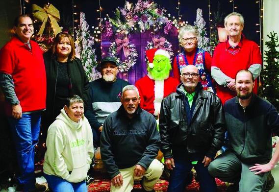 Moving Munday Forward committee that worked to put on the celebration (front row - Carolina and Leroy Torres, Billy Carden, John White - top row - David and Lina Trevino, Tyrone Phillips, the Grinch, Cindie Kessler, Don Thompson) Mandi Perry/Free Spirit Photography