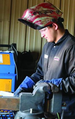 RPTS Last Strike Welding Contest KCHS student Tristan Baxter reads the cutting challenge for the Last Strike contest. Sheri Baty/The Knox County News-Courier