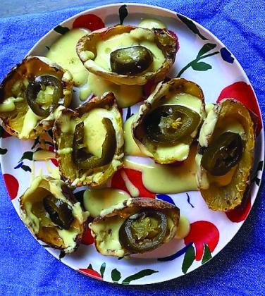 POTATO SKINS This recipe of potato skins with a homemade dairy-free cheezy sauce is budget friendly with the same great restaurant flavor, or better. Utilizing the entire potato, you won’t feel guilty throwing anything away, or having to save for another meal. | ANGELINA LARUE PHOTO