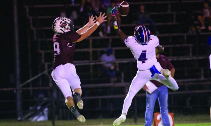 GREYHOUNDSWIN DevinGillorybreaksupthePantherreceptionin Knox City's 48-0 win over Saint Jo Friday night. | SHERI BATY PHOTO