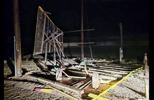 THERE ITWAS On July 21, a desert storm through the Joseph City area destroyed the original sign; Cindy andTony posted this image on their Facebook page during the night. | COURTESY PHOTO