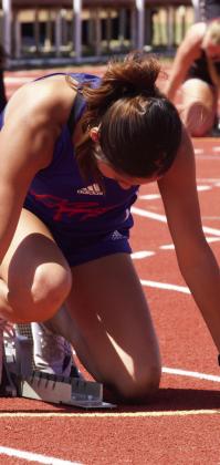 Krystabel Vasquez waits for the start of the 4x100M relay. | SHERI BATY PHOTO