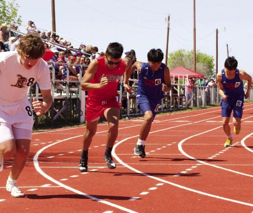 Kyson Shahan, Saul Martinez, and Seth Logsdon are off to the 800M race. | SHERI BATY PHOTO