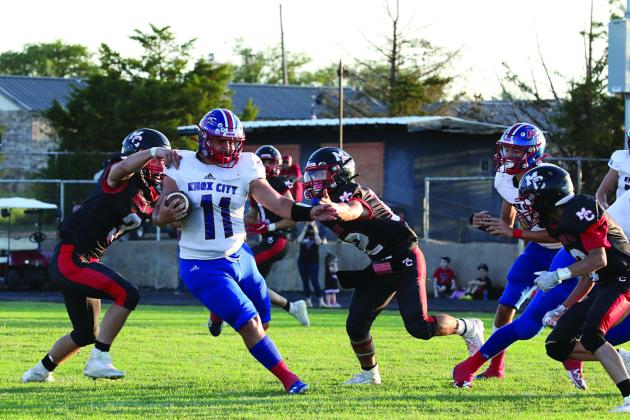 Tristin Baxter breaks the tackle for the first down Sheri Baty/The Knox County News-Courier