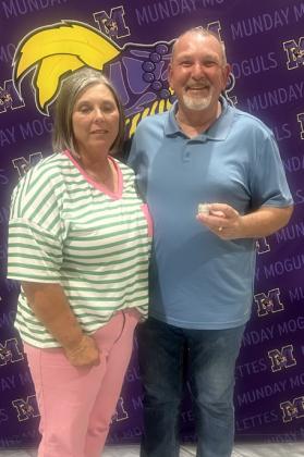 10 YEARS OF SERVICE Renae Parton (left) and Troy Parton (right) received pins for 10 years of service to Munday CISD; honoree Terry Hendrix was not pictured.